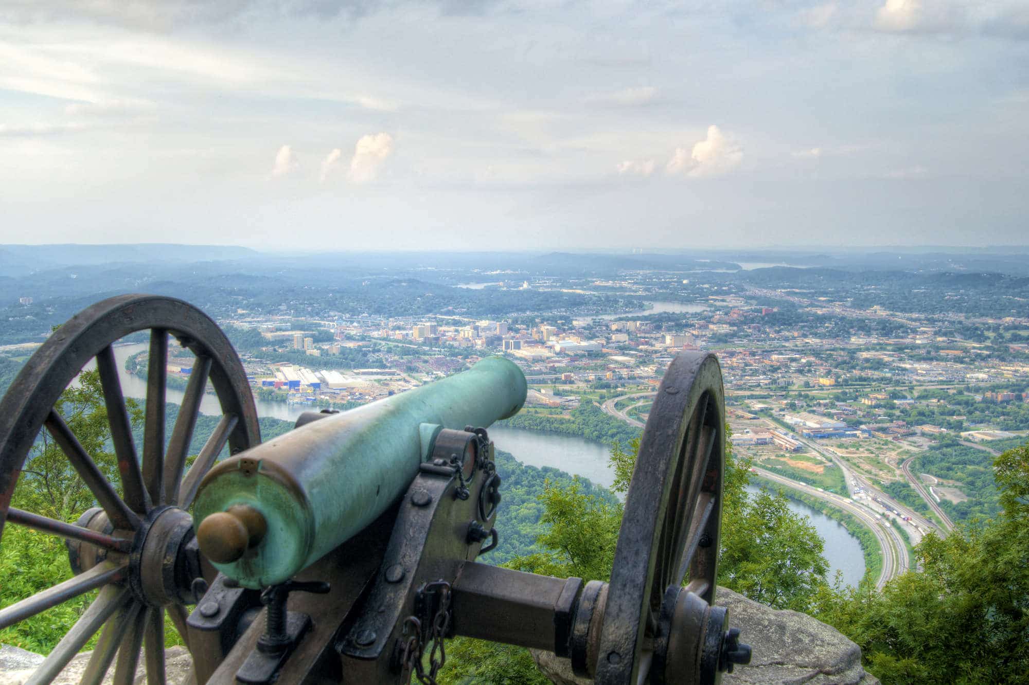 Cannon on Lookout Mountain with a view of downtown Chattanooga in the distance